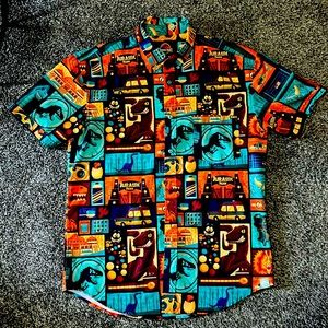 Large button down Jurassic Park shirt.